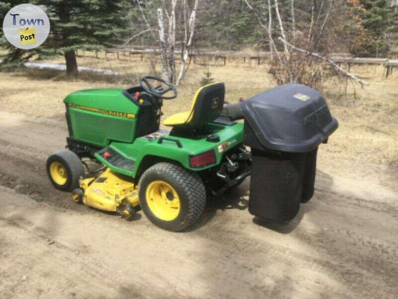 Photo of John Deere 48 inch 3 blade PTO driven mower deck & John Deere POWER FLOW rear bagger