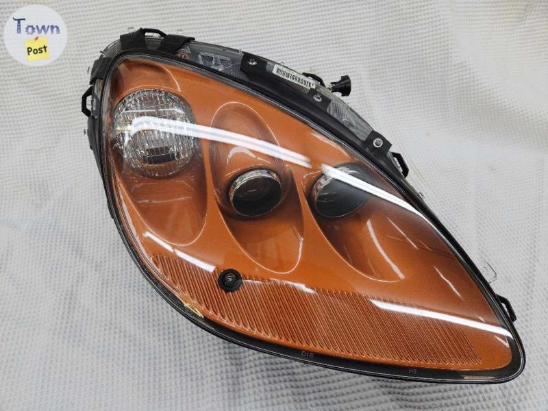 Photo of 2005-2013 Chevrolet Corvette Right hand passengers Side Atomic Orange Headlight OEM